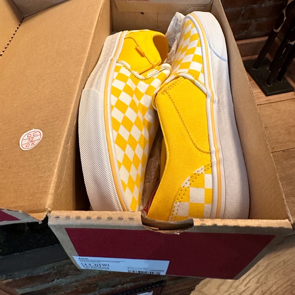 Brand yellow slip on vans never worn